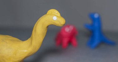 parlak renkler, el-oynamak için kalıp hamuru dinozorlar