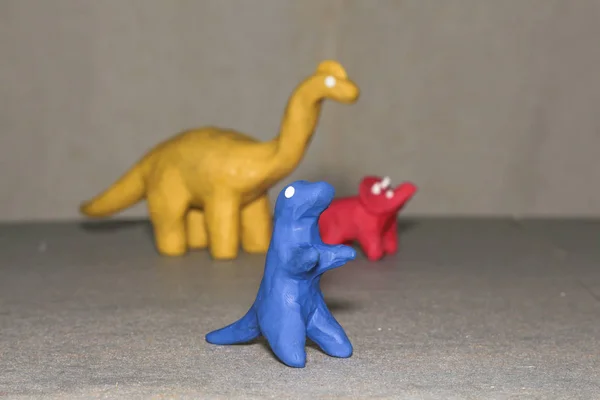 parlak renkler, el-oynamak için kalıp hamuru dinozorlar