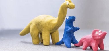 parlak renkler, el-oynamak için kalıp hamuru dinozorlar
