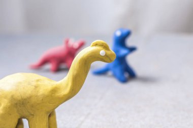 parlak renkler, el-oynamak için kalıp hamuru dinozorlar