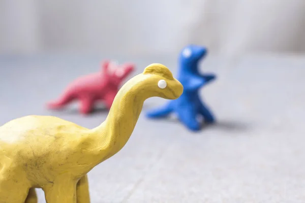 parlak renkler, el-oynamak için kalıp hamuru dinozorlar