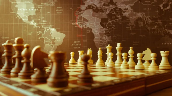 Wood chessboard and pieces at the start of the game with a world map in a shade of yellow