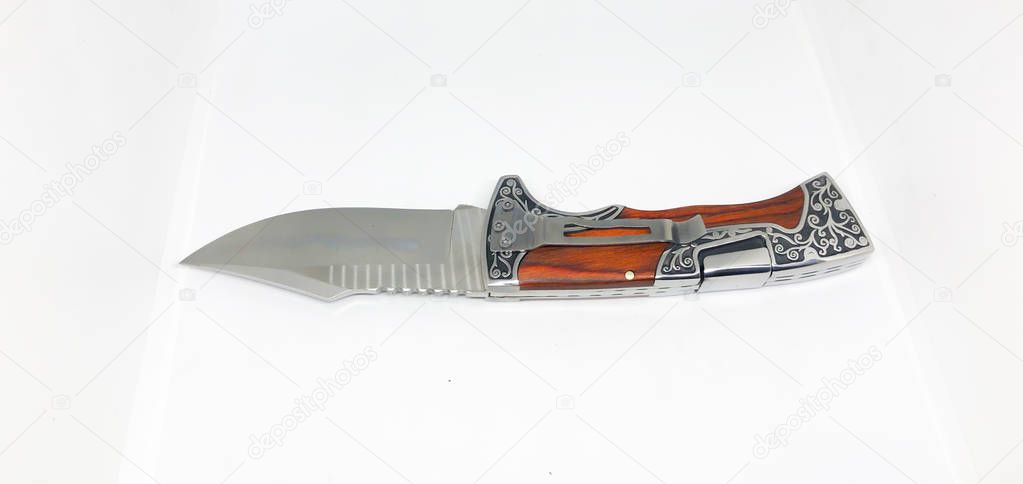 Foldable pocket knife on white background