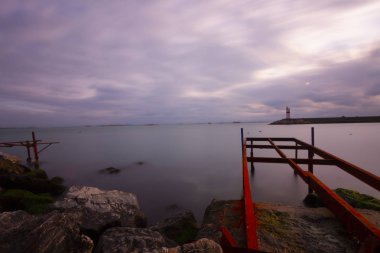 Uzun pozlama iskelesi ve gün batımı