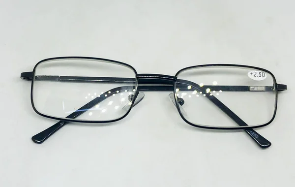 Óculos Numerados Isolados Sobre Fundo Branco — Fotografia de Stock