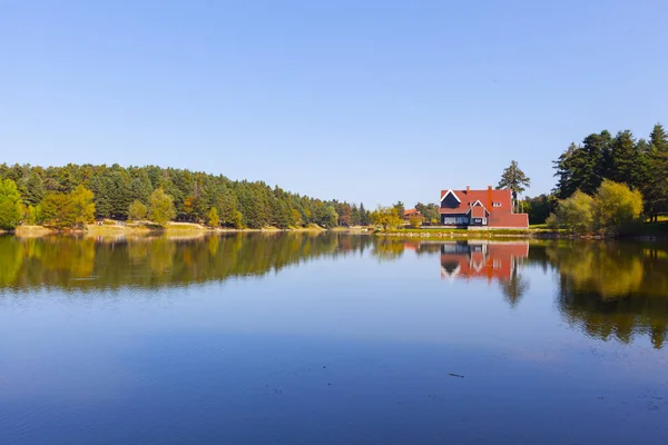 Wooden Lake house inside forest in Bolu Golcuk National Park, Bolu, Turkey