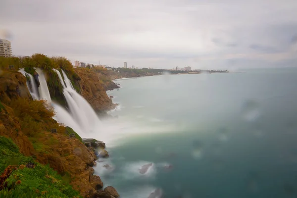 Lower Duden waterfalls on Mediterranean sea coast, Antalya, Turkey, in sunset light