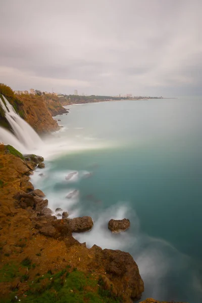 Lower Duden waterfalls on Mediterranean sea coast, Antalya, Turkey, in sunset light