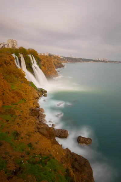 Lower Duden waterfalls on Mediterranean sea coast, Antalya, Turkey, in sunset light