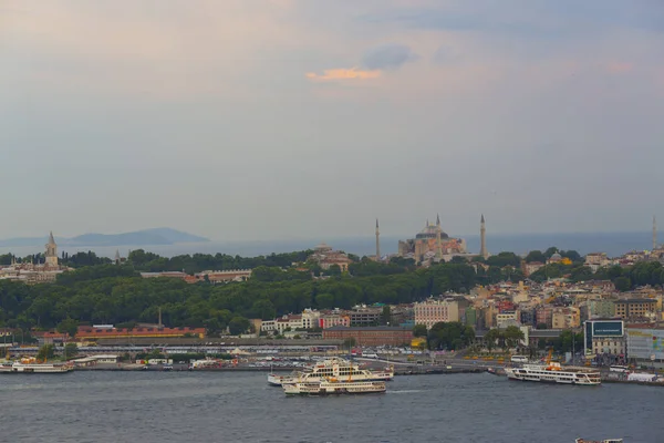 Panoramic view of Golden Horn from Galata Tower. Galata Bridge and Halic Metro Bridge. Istanbul, Turkey.