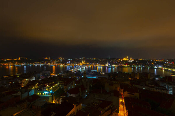 Panoramic view of Golden Horn from Galata Tower. Galata Bridge and Halic Metro Bridge. Istanbul, Turkey.