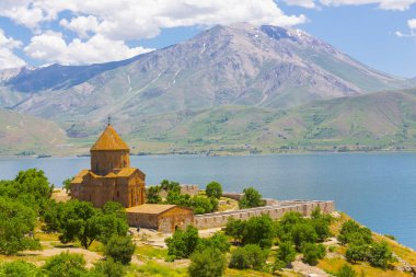 Akdamar island and surp church (Akdamar church) panoramic picture. An important religious place for the Armenian people clipart
