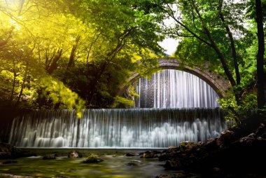 Palaiokarya bridge and waterfall, Thessaly, Greece clipart