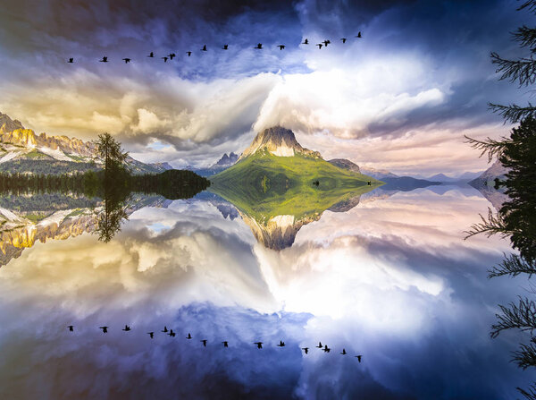 Beautiful view of famous Tre Cime di Lavaredo mountains in the Dolomites mountain range with famous Rifugio Antonio Locatelli alpine hut on a clear starry night in summer, South Tyrol, Italy