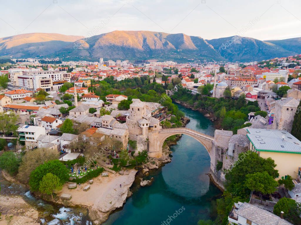 Skyline of Mostar with the Mostar Bridge against the beautiful evening sky