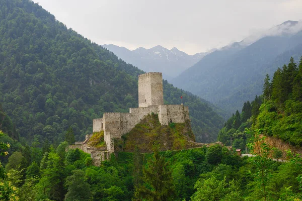 Landscape of Zilkale castle, forest, and cloudy mountains. Castle located in Camlihemsin, Rize, Black Sea region of Turkey