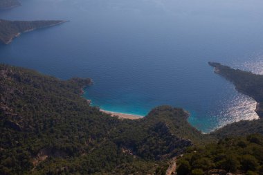 Türkiye 'nin batısındaki Oludeniz / Fethiye ilindeki Kelebek Vadisi (kelebekler vadisi). Bu vadiye sadece kayıkla ya da kaya tırmanışıyla ulaşabilirsiniz.