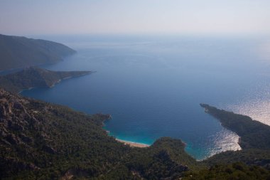 Türkiye 'nin batısındaki Oludeniz / Fethiye ilindeki Kelebek Vadisi (kelebekler vadisi). Bu vadiye sadece kayıkla ya da kaya tırmanışıyla ulaşabilirsiniz.