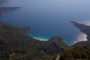 Türkiye 'nin batısındaki Oludeniz / Fethiye ilindeki Kelebek Vadisi (kelebekler vadisi). Bu vadiye sadece kayıkla ya da kaya tırmanışıyla ulaşabilirsiniz.