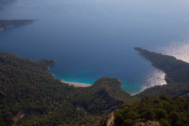 Türkiye 'nin batısındaki Oludeniz / Fethiye ilindeki Kelebek Vadisi (kelebekler vadisi). Bu vadiye sadece kayıkla ya da kaya tırmanışıyla ulaşabilirsiniz.