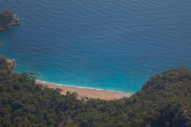 Türkiye 'nin batısındaki Oludeniz / Fethiye ilindeki Kelebek Vadisi (kelebekler vadisi). Bu vadiye sadece kayıkla ya da kaya tırmanışıyla ulaşabilirsiniz.