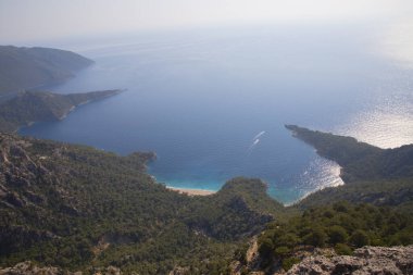 Türkiye 'nin batısındaki Oludeniz / Fethiye ilindeki Kelebek Vadisi (kelebekler vadisi). Bu vadiye sadece kayıkla ya da kaya tırmanışıyla ulaşabilirsiniz.