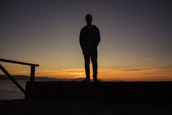 Back lighting model with amazing orange sunset