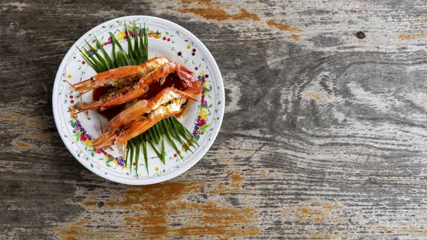 Grilled king prawns in the seafood menu