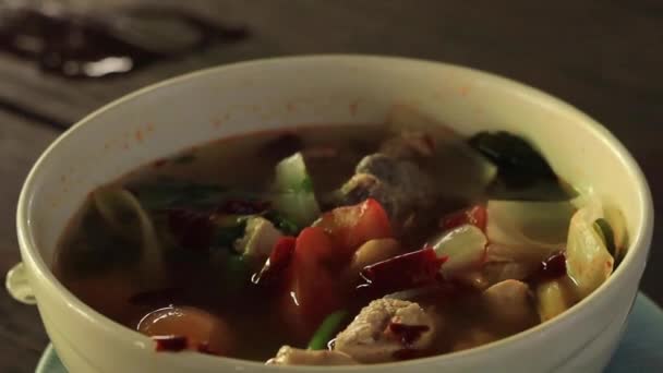 Eating Chicken Tom Yam Thai Food — Stock Video
