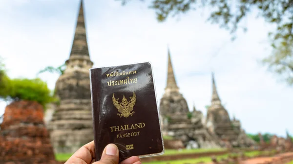 Traveler holding Thailand passport in Ayutthaya Province Thailan — Stock Photo, Image