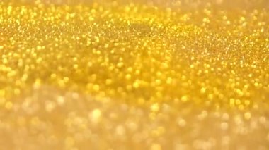 Yavaş çekimde altın parıltısı güzel