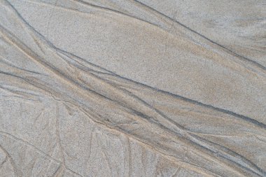 Güzel doğal doku tasarım gelgit tarafından sahilde yaptı