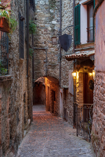Typical Italian narrow street, Apricale ancient village, Province of Imperia, Italy