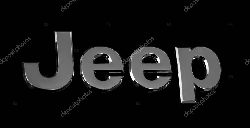 Monte-Carlo, Monaco - February 8, 2011: Closeup of elegantly designed Jeep car logo on a black car