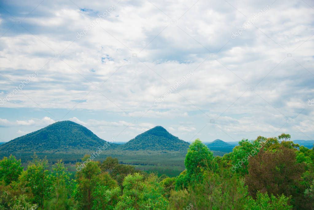 Glass House Mountains nearby Brisbane city in Queensland, Australia. Australia is a continent located in the south part of the earth.