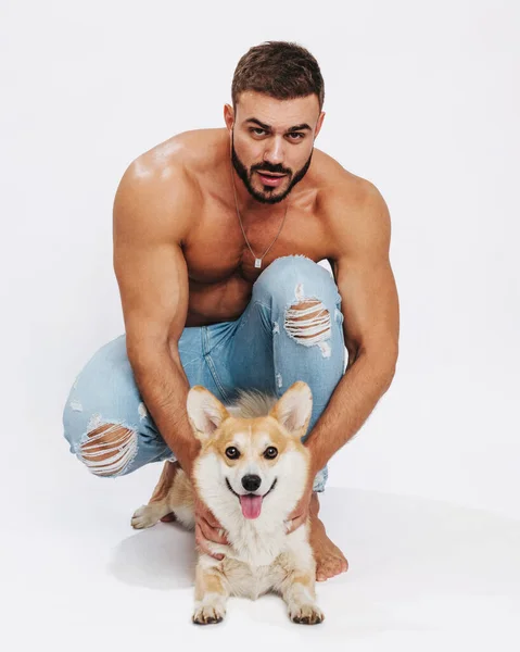 Male Fitness Model Dog Corgi — Stock Photo, Image