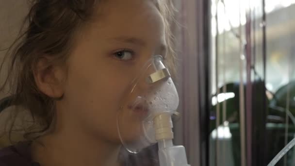 Little girl is being treated for a cold. slow motion — Stock Video