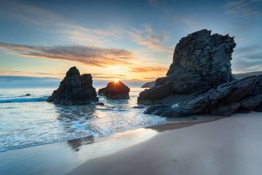 Stunning sunrise over sea stacks at Sango Bay in Durness on the north west coast of Scotland clipart