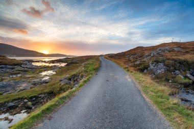 A single track road leading to Luskentyre beach on the Isle of Harris clipart