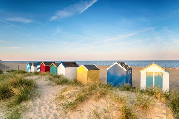 Beach huts in sand dunes at Southwold — Stock Photo, Image
