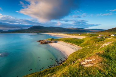 Looking across the Sound of Taransay to Luskentyre beach from Seilebost on the Isle of Harris in the Western Isles of Scotland clipart