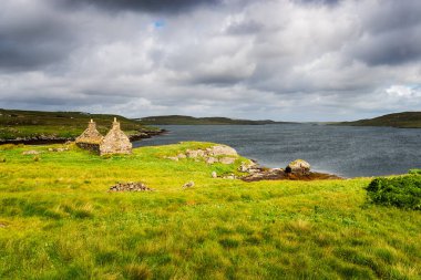 A ruined croft house at Kirkibost on the Ilse of Great Bernera in the Western Isles of Scotland clipart