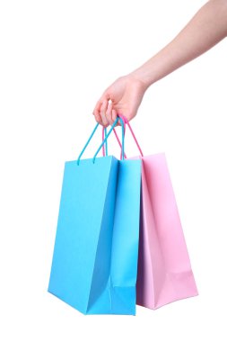 El izole kavramı alışveriş beyaz arka plan üzerinde renkli kağıt torba tutarak