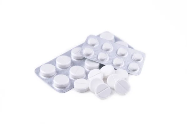 White pills in blister isolated on white background — Stock Photo, Image