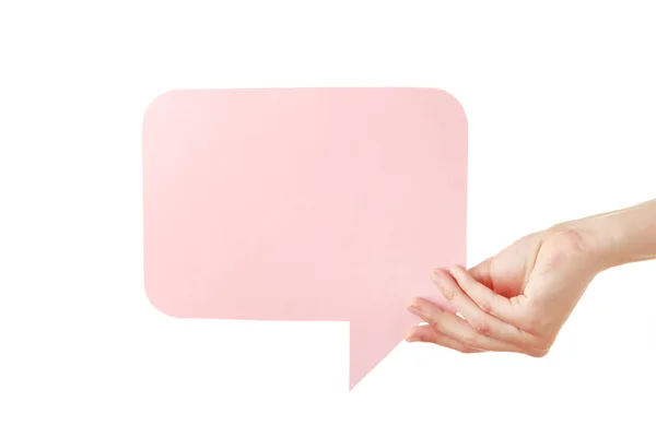 Hand Met Een Roze Spraakbel Geïsoleerd Een Witte Achtergrond Bovenaanzicht — Stockfoto