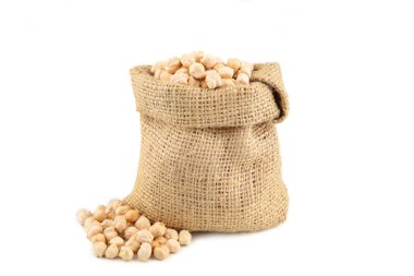 Chickpea in bag isolated on white background. Vegan food concept clipart