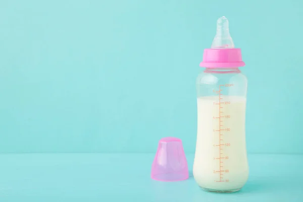 Baby Milk Bottle Blue Background Copy Space Top View — Stock Photo, Image