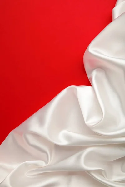 Smooth Elegant White Silk Red Background Top View — Stock Photo, Image