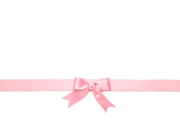 Roze Pastel Lint Met Strik Geïsoleerd Een Witte Achtergrond Bovenaanzicht — Stockfoto