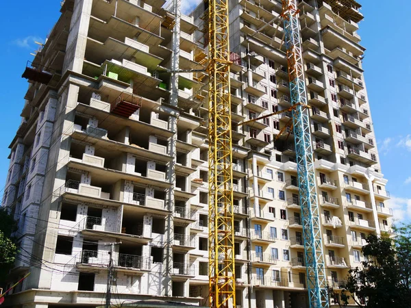 Concrete building under construction. Building site.